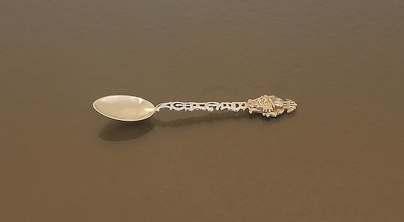 Antique Sterling Silver “BRIGHTON” Souvenir Spoon – T.L.&S. – English Hallmarks – Reg. No. RD373316 – Ornate Heraldic Top - 4-1/2"