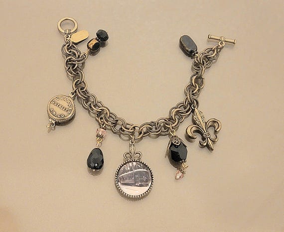 Vintage Grandmother’s Buttons Charm Bracelet – New Orleans Streetcar Photo Locket, Fleur-de-Lis, Black Crystal Beads, Antique Brass Tone Sta