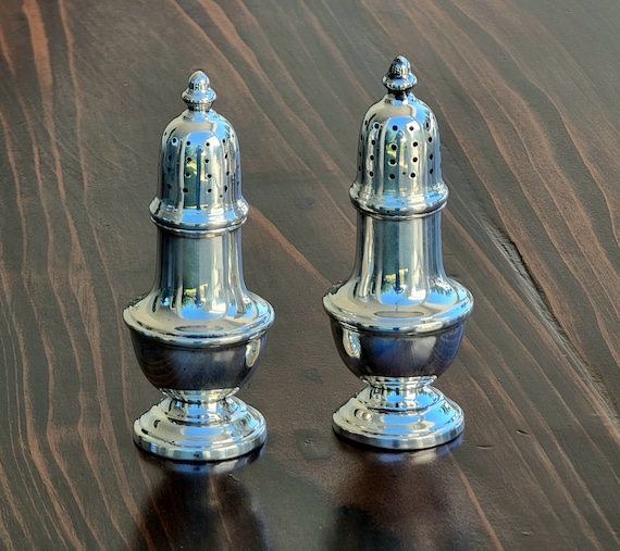 Pair of Sterling Silver Salt and Pepper Shakers by J.E. Calwell & Co. Circa 1910