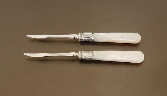 Pair of Mother-of-Pearl and Silver Nut Picks