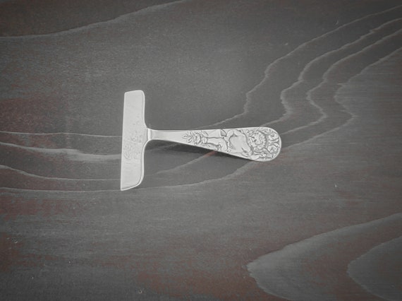 Sterling Silver Cupid Baby Food Pusher