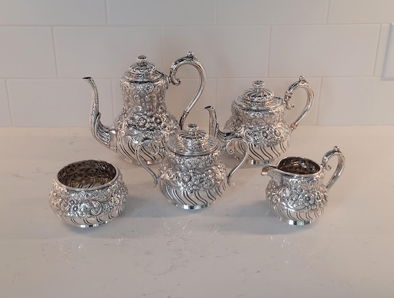 Tea and Coffee Set - Repousse Style Retailed by M. Scooler of New Orleans