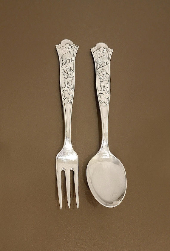 Vintage European “Hotel Silver” Child Spoon & Fork Set – 5-7/8” – Alpine Shepherd / Goat / Dog Motif – Marked 60 GR H.S. – Heavy Silverplate