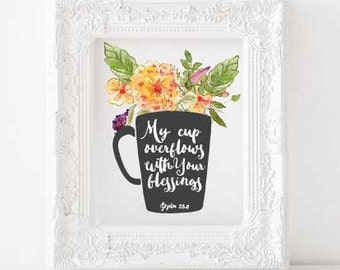 May include: A black and white printable art print with a watercolor illustration of a cup overflowing with flowers. The text reads "My cup overflows with your blessings, Psalm 23:5".