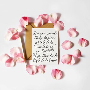 May include: A white card with black text on a brown envelope surrounded by pink rose petals. The text reads: "Do you want this design printed & mailed as an 8x10? Use the link listed below!"