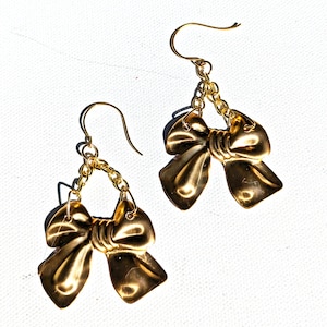 Pressing ear tops discount