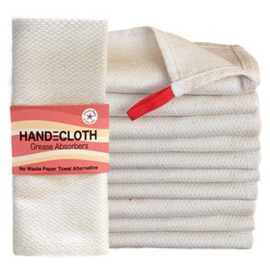 May include: A stack of 10 white cotton hand cloths with red hanging loops. The cloths are made in the USA and are labeled "HANDECLOTHE Grease Absorbers No Waste Paper Towel Alternative".
