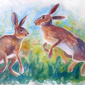 Aquarellmalerei tanzender Hasen im Frühling