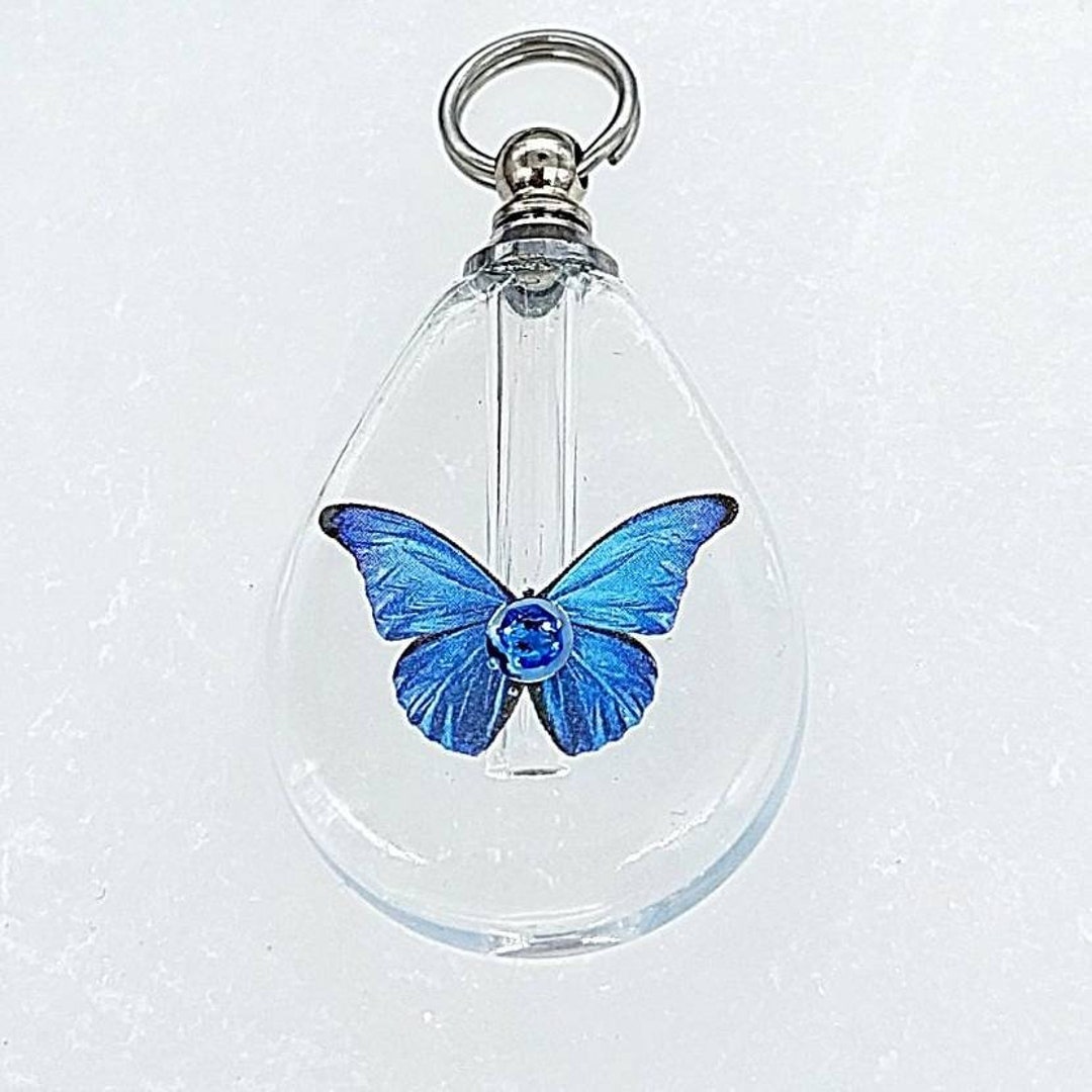 BLUE AND SILVER JEWELED BUTTERFLY CREMATION ASH JEWELRY