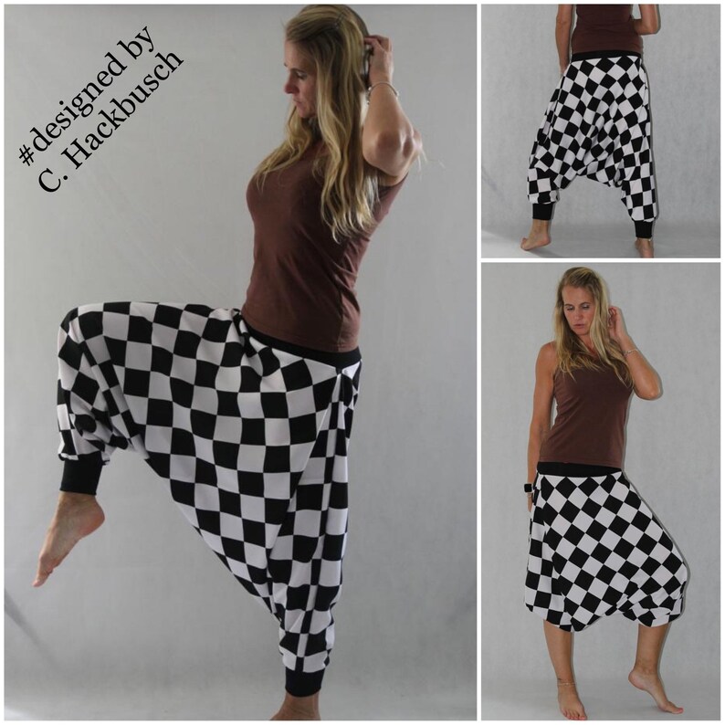 May include: Black and white checkered harem pants with a wide leg and elastic waistband. The pants are designed by C. Hackbusch.