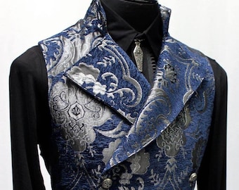 May include: A blue and silver patterned waistcoat with a wide collar and multiple buttons. The waistcoat has a brocade design and a shawl collar.