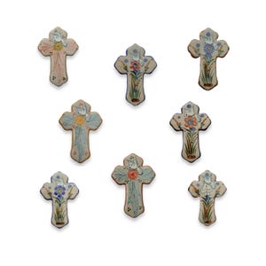 Ceramic cross with floral and dove motifs