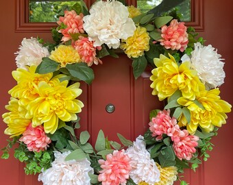 Pink and yellow floral wreath for front door, summer foliage, flower wreath