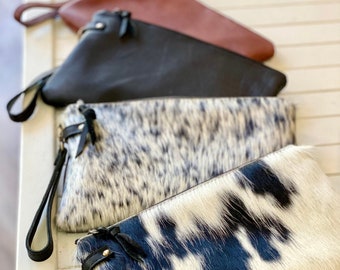 The perfect clutch! Black & white cowhide or buttery soft leather wristlet clutch or small crossbody purse.