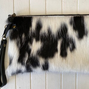 The perfect clutch Black & white cowhide or buttery soft leather wristlet clutch or small crossbody purse. Cowhide #1