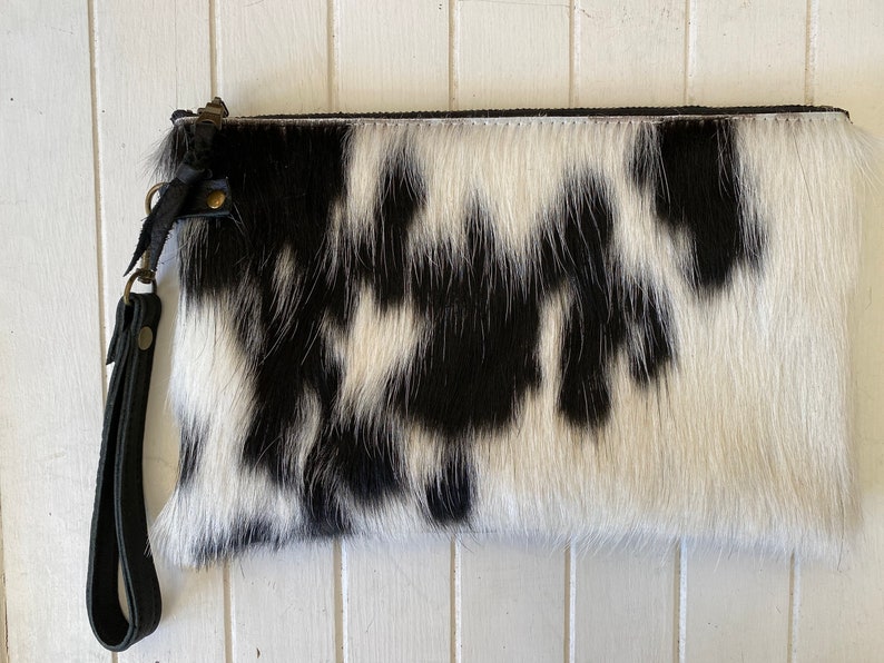 The perfect clutch Black & white cowhide or buttery soft leather wristlet clutch or small crossbody purse. Cowhide #1