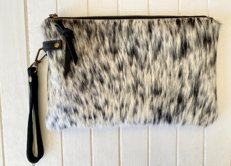 The perfect clutch Black & white cowhide or buttery soft leather wristlet clutch or small crossbody purse. Cowhide #2