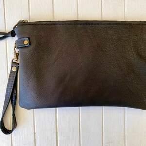 The perfect clutch Black & white cowhide or buttery soft leather wristlet clutch or small crossbody purse. Black