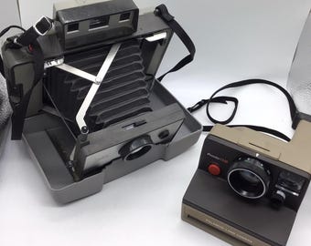 2 zabytkowe aparaty Polaroid Land Pronto SM i 320
