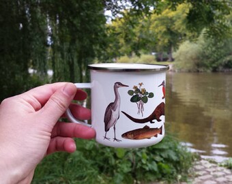 Enamel mug with River species by Alice Draws the Line;featuring illustrations of River Wildlife & Flora including fish, otter and kingfisher