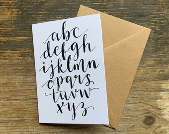 Alphabet card by Alice Draws The Line featuring hand brush lettering, modern calligraphy for any lettering lovers. Blank inside