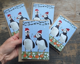 Puffin Christmas Cards with illustrations by Alice Draws the Line;with Puffins wearing Christmas Hats. Available individually or a pack of 4