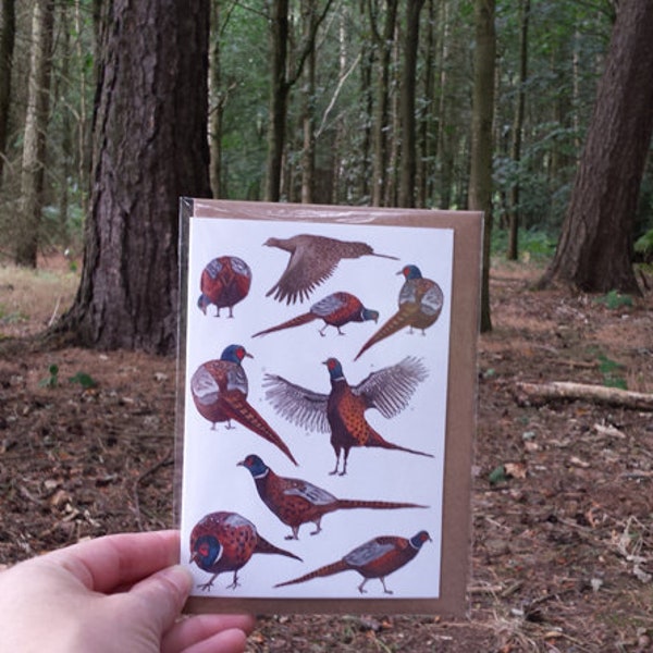 Pheasants Greeting Card by Alice Draws The Line featuring a range of illustrations of male pheasants & one female flying over. Blank inside.