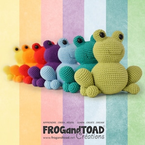 May include: A row of colorful, crocheted frog plushies in a rainbow of hues, from yellow to green. Each frog has black button eyes and is sitting upright. The background is a series of vertical color stripes. The Frog and Toad Creations logo is at the bottom.