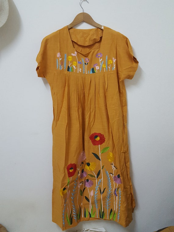 yellow embroidered dress