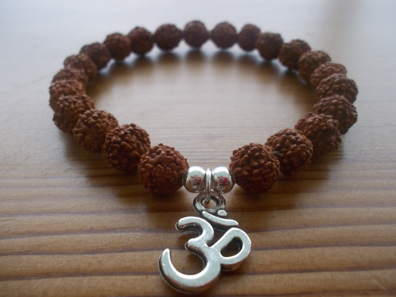 Om bracelet with rudraksha deals