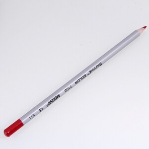 May include: A red colored pencil with a silver barrel. The barrel is labeled "MARCO'S" and "RAFFINE COLOR 2100".