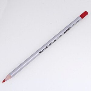 May include: A red colored pencil with a silver barrel. The barrel is labeled "RAFFINE&trade; COLOR 7100 MARCO&reg; CE 511".