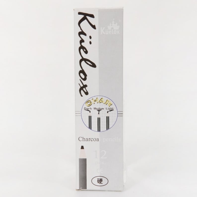 May include: A box of 12 charcoal pencils labeled "Kuelox" with a black and white illustration of three pencils labeled "Charcoal Dark, Medium, Light".