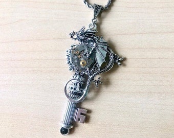 Steampunk dragon key necklace with watch movement and silver dragon