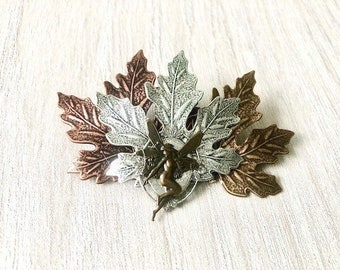 Broche art nouveau avec elfe  et feuilles d’érable