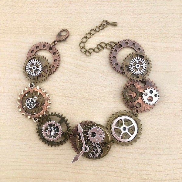 Bracelet steampunk bronze, cuivre et argent avec rouages et aiguilles de montre