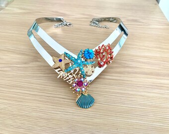 Bib necklace with enameled seashells and starfish