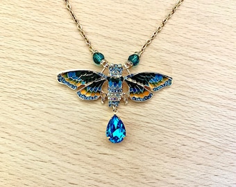 Collier art déco Cigale bleu et or avec cristal Swarovski et chaîne en acier inoxydable or