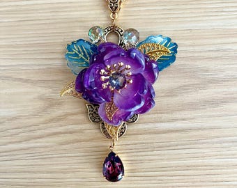 Paarse bloemhanger, bloemenketting, bloemensieraden