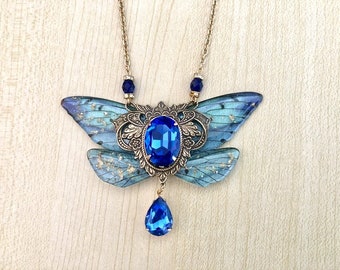 Collier ailes de fées, Papillon bleu et or, collier féerique cristal bleu