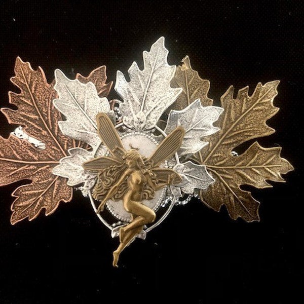 Art nouveau style hair barrette with elf and maple leaves.