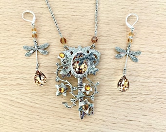 The golden key set with silver key, dragonfly, ivy leaves and champagne Swarovski crystal