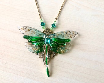 Art Nouveau dragonfly necklace in green and gold enamel, transparent wings