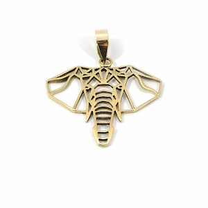 May include: A gold-coloured elephant head pendant. The pendant has a geometric design and a loop at the top for a chain. The elephant's head is detailed with lines and shapes, creating a modern and stylish appearance. The pendant is suitable for a necklace.