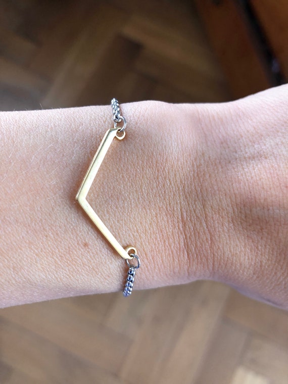 Adjustable Silver Bracelet With Sliding Clasp and Gold Arrow
