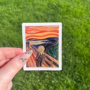 May include: A sticker featuring Edvard Munch's iconic painting "The Scream". The painting depicts a figure with a distorted face and a swirling background of red, yellow, and blue.