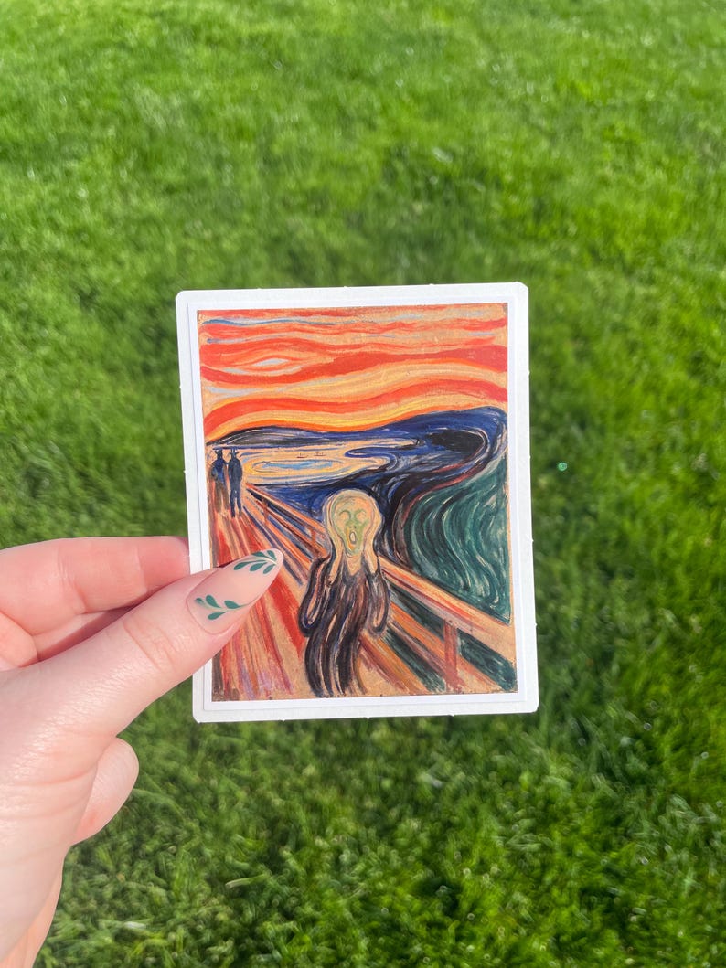 May include: A sticker featuring a reproduction of Edvard Munch's famous painting "The Scream". The painting depicts a figure with a distorted face and a swirling, colourful background.
