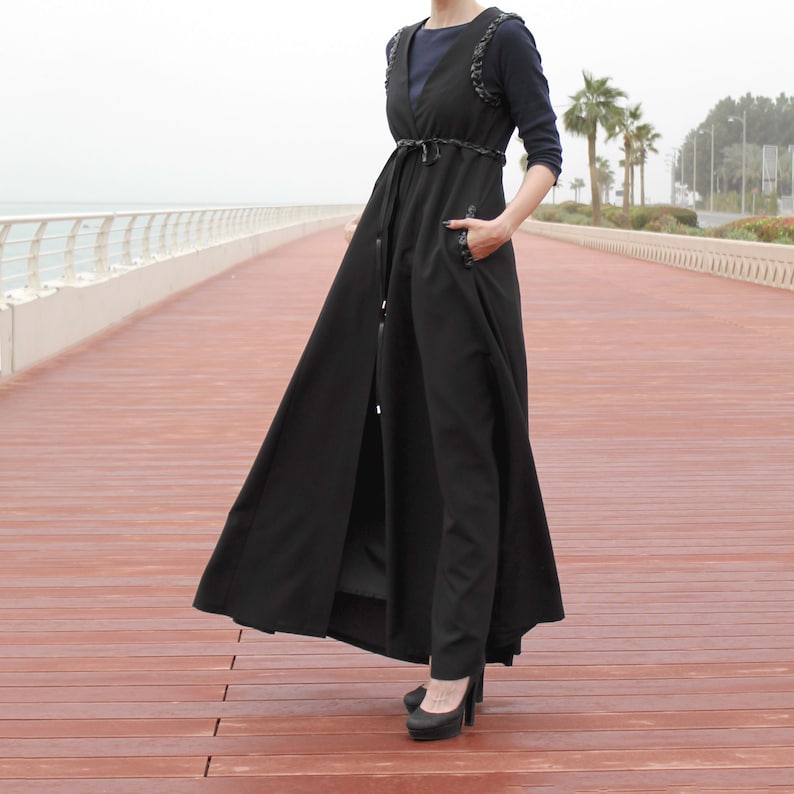 Pockets and Braided Decor at Waist and Shoulders Loose Long Sleeveless Jacket Black Long Line Sleeveless Vest Jacket with Belt