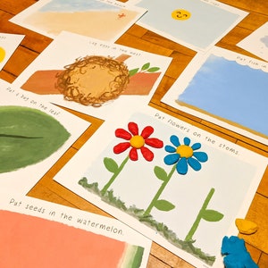 Puede incluir: Un conjunto de ocho tarjetas de actividades imprimibles para ni&ntilde;os con diversos temas como la naturaleza, los animales y la comida. Cada tarjeta tiene una instrucci&oacute;n simple como "Acaricia una bolsa en la hoja" o "Pon semillas en la sand&iacute;a" y una imagen correspondiente para guiar la actividad.