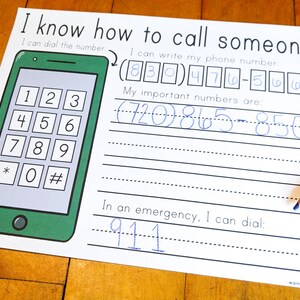May include: A printable worksheet for learning how to call someone. It features a cartoon phone with a keypad and space to write phone numbers. The worksheet includes the text "I know how to call someone." and instructions for dialing and writing phone numbers. It also includes space to write important numbers and an emergency number.